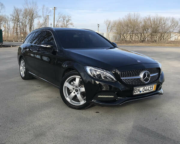 Черный Мерседес Ц-Класс, объемом двигателя 2.1 л и пробегом 207 тыс. км за 16800 $, фото 1 на Automoto.ua