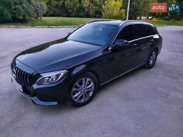 Черный Мерседес Ц-Класс, объемом двигателя 2.1 л и пробегом 145 тыс. км за 24000 $, фото 2 на Automoto.ua