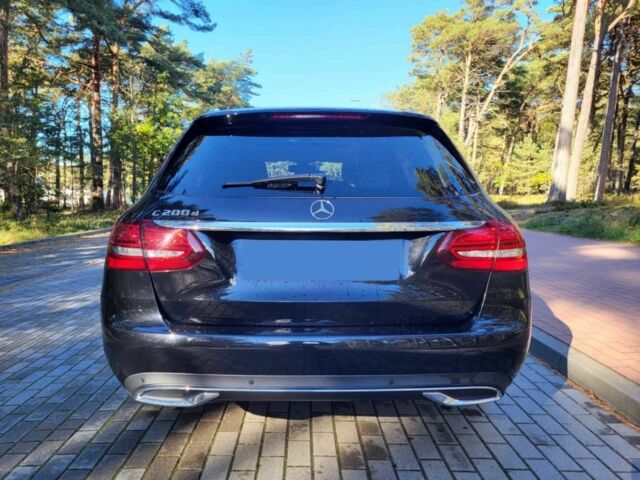 Чорний Мерседес Ц-Клас, об'ємом двигуна 2 л та пробігом 35 тис. км за 7100 $, фото 6 на Automoto.ua