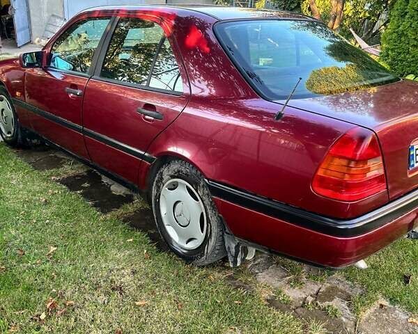 Червоний Мерседес Ц-Клас, об'ємом двигуна 2 л та пробігом 340 тис. км за 3000 $, фото 10 на Automoto.ua