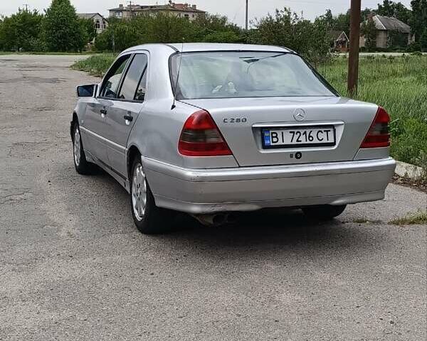 Сірий Мерседес Ц-Клас, об'ємом двигуна 2.8 л та пробігом 450 тис. км за 1700 $, фото 1 на Automoto.ua