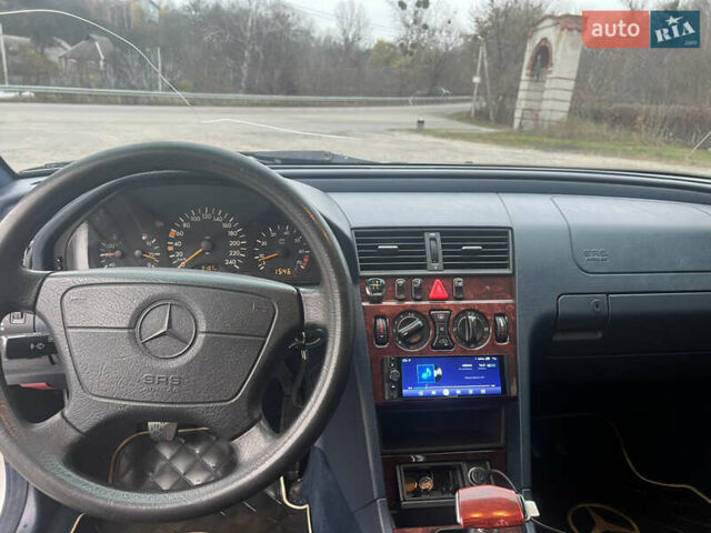 Серый Мерседес Ц-Класс, объемом двигателя 1.8 л и пробегом 296 тыс. км за 3500 $, фото 30 на Automoto.ua