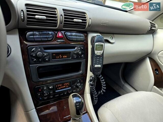 Серый Мерседес Ц-Класс, объемом двигателя 1.8 л и пробегом 176 тыс. км за 7500 $, фото 147 на Automoto.ua