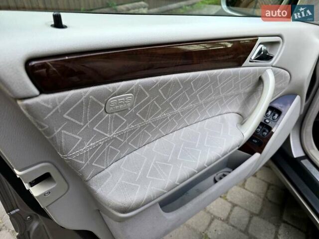 Серый Мерседес Ц-Класс, объемом двигателя 1.8 л и пробегом 176 тыс. км за 7500 $, фото 134 на Automoto.ua