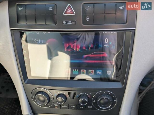 Мерседес Ц-Класс 2005 в Ровно на Automoto.ua Синий Мерседес Ц-Класс, объемом двигателя 2.1 л и пробегом 305 тыс. км за 6450 $, фото 33 на Automoto.ua