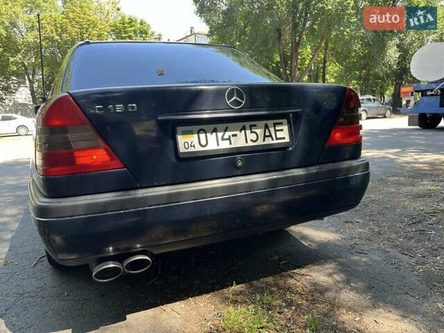 Синий Мерседес Ц-Класс, объемом двигателя 1.8 л и пробегом 300 тыс. км за 2800 $, фото 2 на Automoto.ua