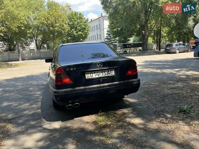 Синий Мерседес Ц-Класс, объемом двигателя 1.8 л и пробегом 300 тыс. км за 2800 $, фото 3 на Automoto.ua
