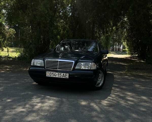 Синий Мерседес Ц-Класс, объемом двигателя 1.8 л и пробегом 300 тыс. км за 2800 $, фото 21 на Automoto.ua