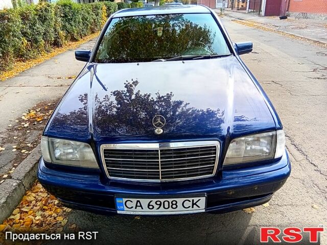Синій Мерседес Ц-Клас, об'ємом двигуна 1.8 л та пробігом 365 тис. км за 2500 $, фото 1 на Automoto.ua