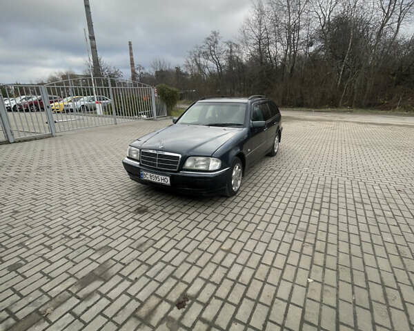 Синій Мерседес Ц-Клас, об'ємом двигуна 2 л та пробігом 460 тис. км за 3100 $, фото 1 на Automoto.ua