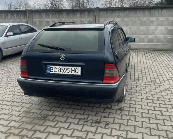 Синій Мерседес Ц-Клас, об'ємом двигуна 2 л та пробігом 460 тис. км за 3100 $, фото 4 на Automoto.ua