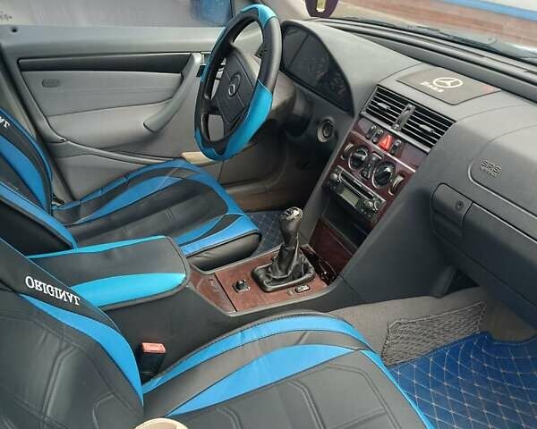 Синий Мерседес Ц-Класс, объемом двигателя 1.8 л и пробегом 395 тыс. км за 3400 $, фото 35 на Automoto.ua