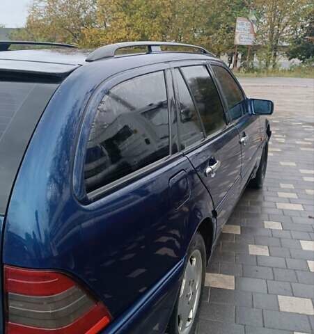 Синий Мерседес Ц-Класс, объемом двигателя 1.8 л и пробегом 250 тыс. км за 3000 $, фото 45 на Automoto.ua