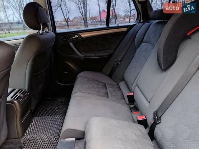 Синий Мерседес Ц-Класс, объемом двигателя 1.8 л и пробегом 286 тыс. км за 5500 $, фото 36 на Automoto.ua