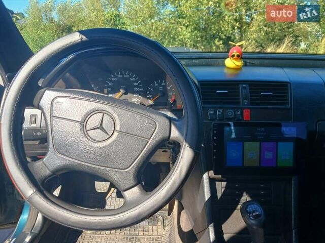 Зеленый Мерседес Ц-Класс, объемом двигателя 1.8 л и пробегом 358 тыс. км за 2500 $, фото 14 на Automoto.ua