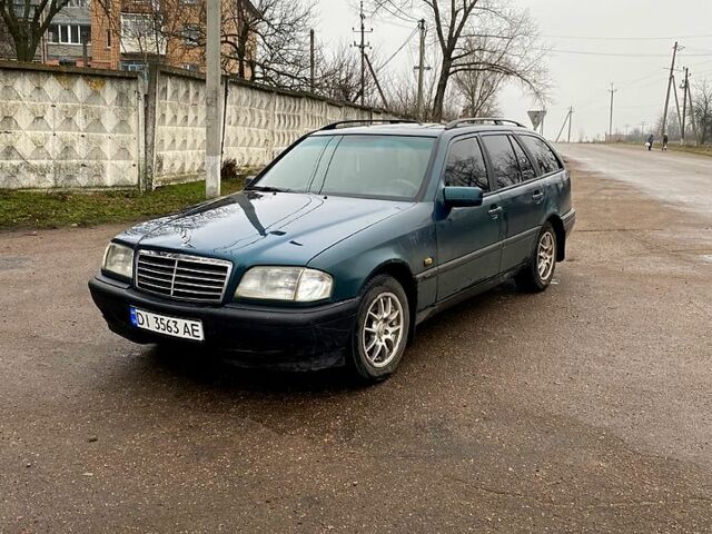 Зеленый Мерседес Ц-Класс, объемом двигателя 1.8 л и пробегом 350 тыс. км за 2100 $, фото 4 на Automoto.ua