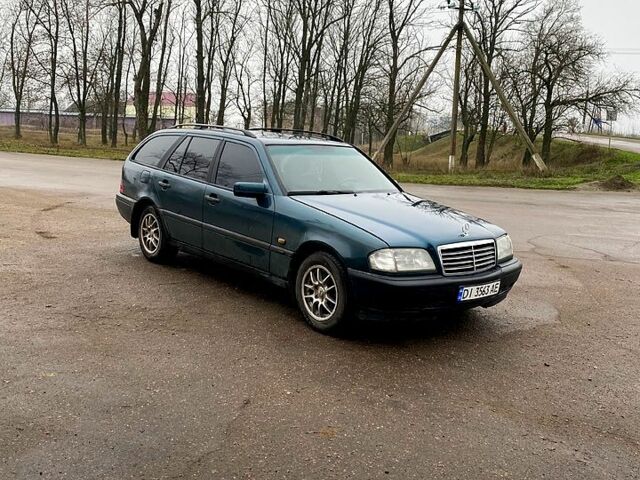 Зеленый Мерседес Ц-Класс, объемом двигателя 1.8 л и пробегом 350 тыс. км за 2100 $, фото 5 на Automoto.ua