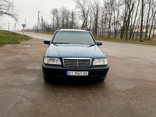 Зеленый Мерседес Ц-Класс, объемом двигателя 1.8 л и пробегом 350 тыс. км за 2100 $, фото 3 на Automoto.ua