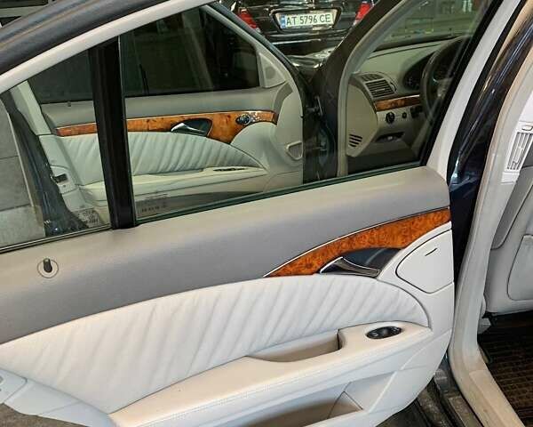 Синій Мерседес E 200, об'ємом двигуна 1.8 л та пробігом 300 тис. км за 8300 $, фото 20 на Automoto.ua