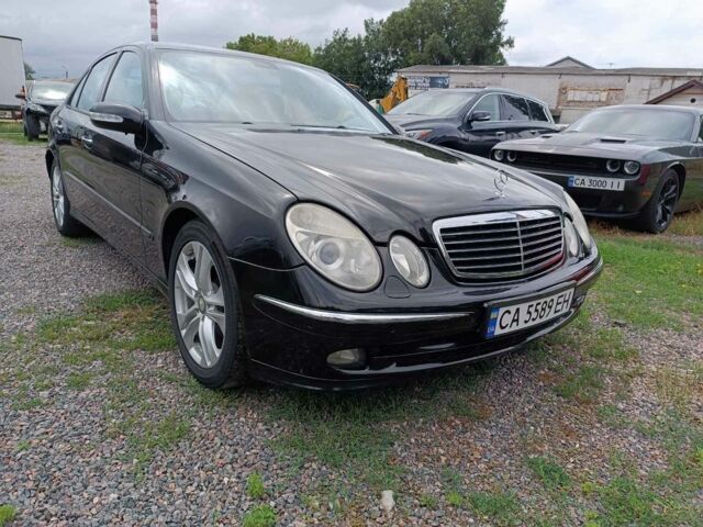 Черный Мерседес E 220, объемом двигателя 2.1 л и пробегом 321 тыс. км за 8500 $, фото 11 на Automoto.ua