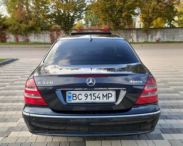 Черный Мерседес E 240, объемом двигателя 2.6 л и пробегом 250 тыс. км за 7200 $, фото 6 на Automoto.ua