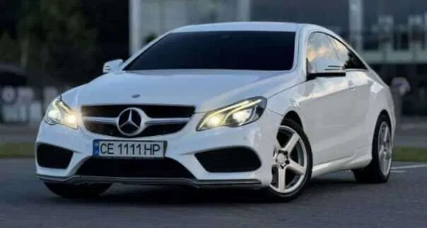 Білий Мерседес Е-Клас, об'ємом двигуна 2 л та пробігом 150 тис. км за 23654 $, фото 2 на Automoto.ua