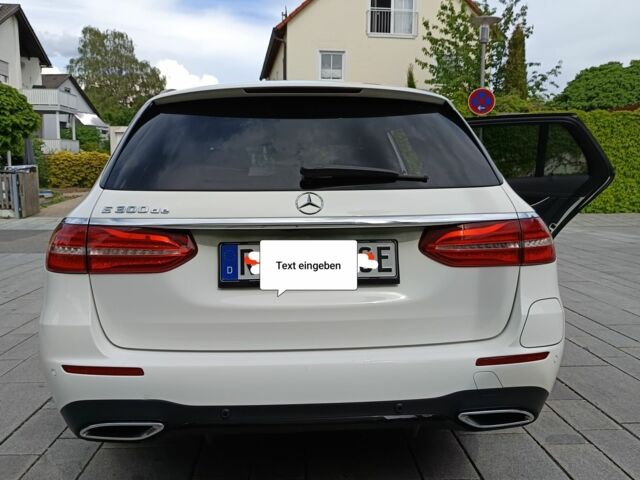 Білий Мерседес Е-Клас, об'ємом двигуна 2 л та пробігом 110 тис. км за 31338 $, фото 9 на Automoto.ua