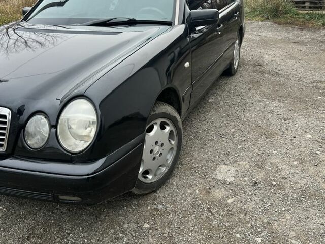 Чорний Мерседес Е-Клас, об'ємом двигуна 2.3 л та пробігом 400 тис. км за 2450 $, фото 1 на Automoto.ua