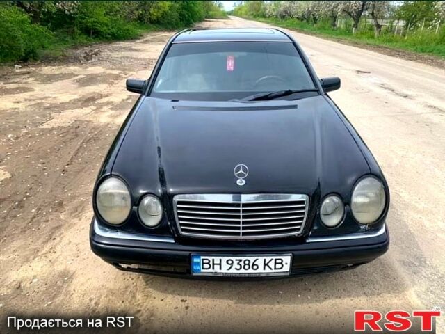 Черный Мерседес Е-Класс, объемом двигателя 2.3 л и пробегом 0 тыс. км за 2299 $, фото 1 на Automoto.ua