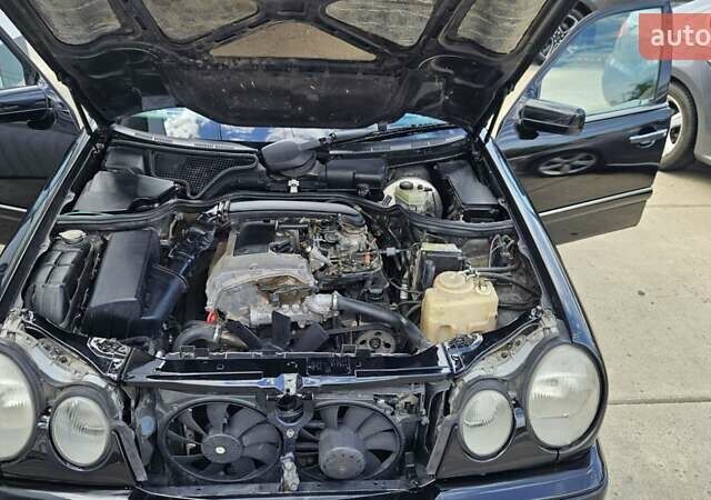 Черный Мерседес Е-Класс, объемом двигателя 2.3 л и пробегом 400 тыс. км за 4400 $, фото 15 на Automoto.ua