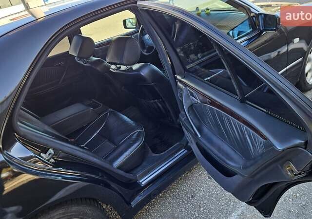 Черный Мерседес Е-Класс, объемом двигателя 2.3 л и пробегом 400 тыс. км за 4400 $, фото 2 на Automoto.ua