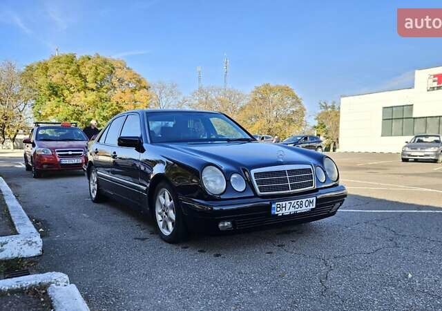 Черный Мерседес Е-Класс, объемом двигателя 2.3 л и пробегом 400 тыс. км за 4400 $, фото 1 на Automoto.ua