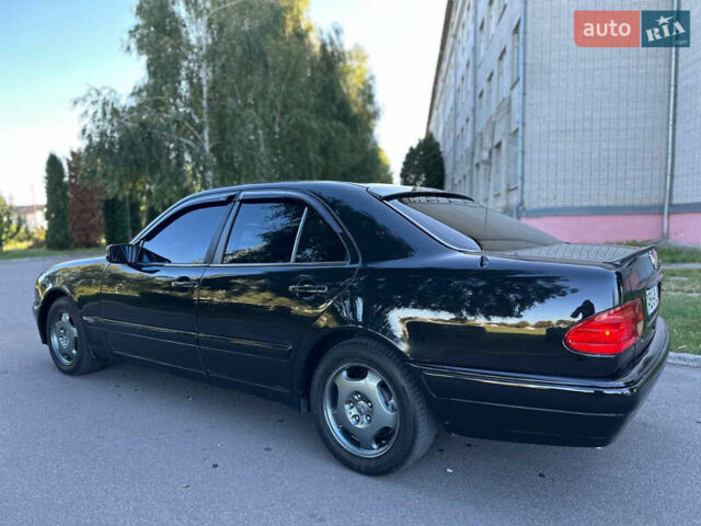 Черный Мерседес Е-Класс, объемом двигателя 2 л и пробегом 390 тыс. км за 2999 $, фото 22 на Automoto.ua