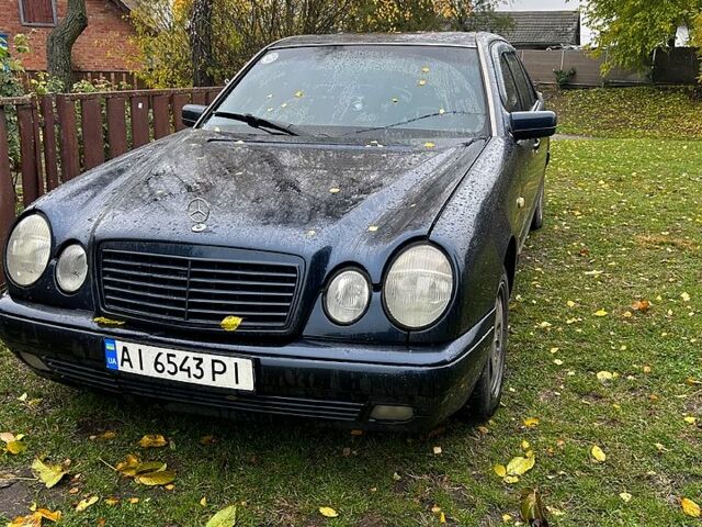 Черный Мерседес Е-Класс, объемом двигателя 2.3 л и пробегом 317 тыс. км за 3500 $, фото 1 на Automoto.ua