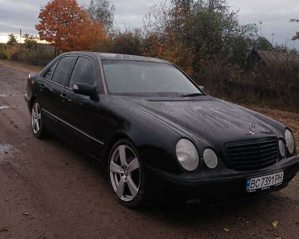 Чорний Мерседес Е-Клас, об'ємом двигуна 2 л та пробігом 360 тис. км за 2900 $, фото 5 на Automoto.ua