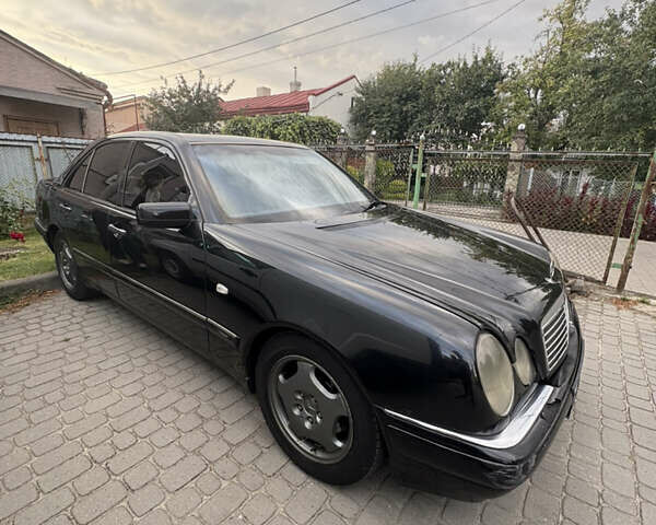 Черный Мерседес Е-Класс, объемом двигателя 2 л и пробегом 478 тыс. км за 3800 $, фото 10 на Automoto.ua