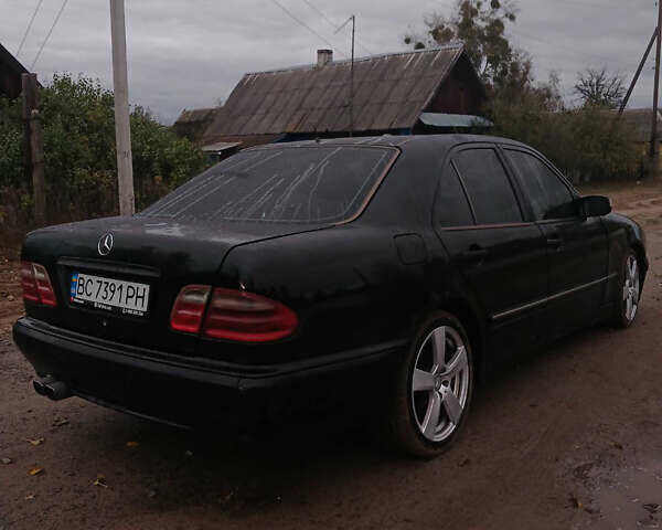 Чорний Мерседес Е-Клас, об'ємом двигуна 2 л та пробігом 360 тис. км за 2900 $, фото 3 на Automoto.ua