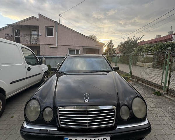 Черный Мерседес Е-Класс, объемом двигателя 2 л и пробегом 478 тыс. км за 3800 $, фото 1 на Automoto.ua