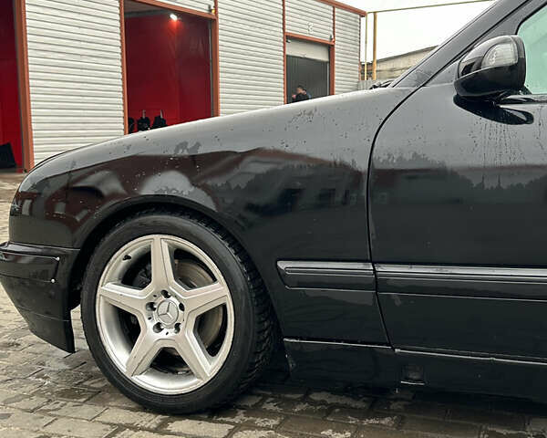 Чорний Мерседес Е-Клас, об'ємом двигуна 2 л та пробігом 528 тис. км за 5000 $, фото 12 на Automoto.ua