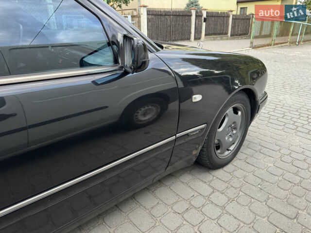 Черный Мерседес Е-Класс, объемом двигателя 2 л и пробегом 478 тыс. км за 3800 $, фото 8 на Automoto.ua