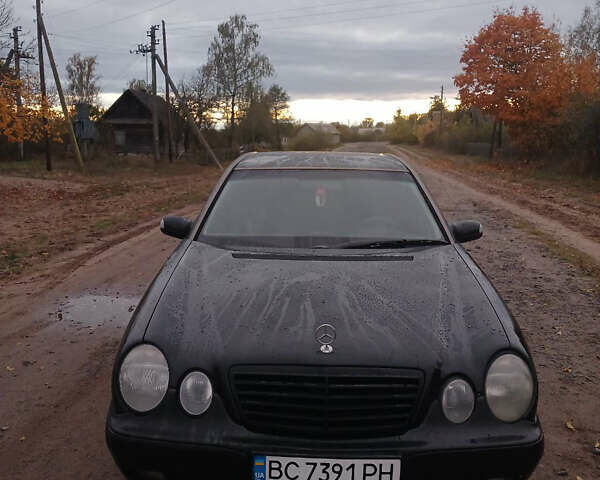 Чорний Мерседес Е-Клас, об'ємом двигуна 2 л та пробігом 360 тис. км за 2900 $, фото 1 на Automoto.ua