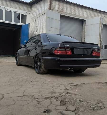 Черный Мерседес Е-Класс, объемом двигателя 5.5 л и пробегом 500 тыс. км за 20000 $, фото 2 на Automoto.ua