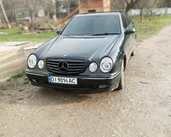 Черный Мерседес Е-Класс, объемом двигателя 2 л и пробегом 280 тыс. км за 2899 $, фото 7 на Automoto.ua