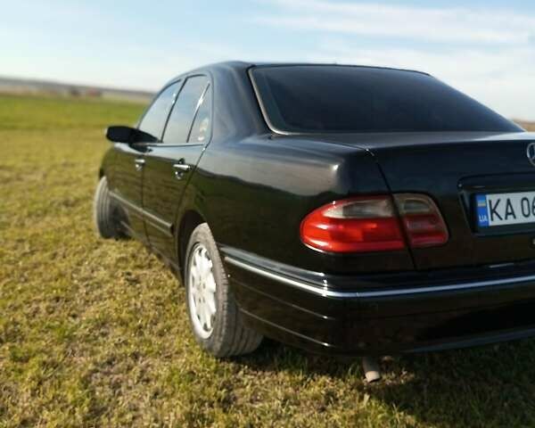 Черный Мерседес Е-Класс, объемом двигателя 2 л и пробегом 250 тыс. км за 3000 $, фото 1 на Automoto.ua