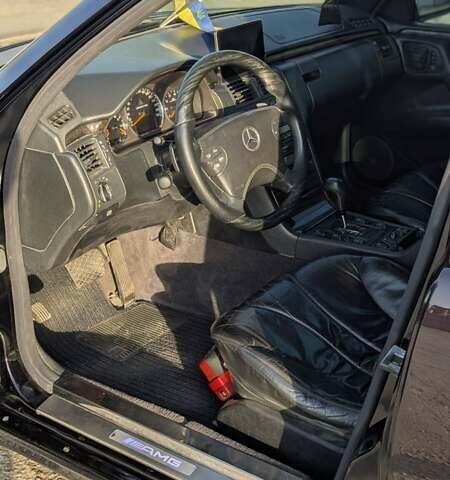 Черный Мерседес Е-Класс, объемом двигателя 5.5 л и пробегом 500 тыс. км за 20000 $, фото 12 на Automoto.ua