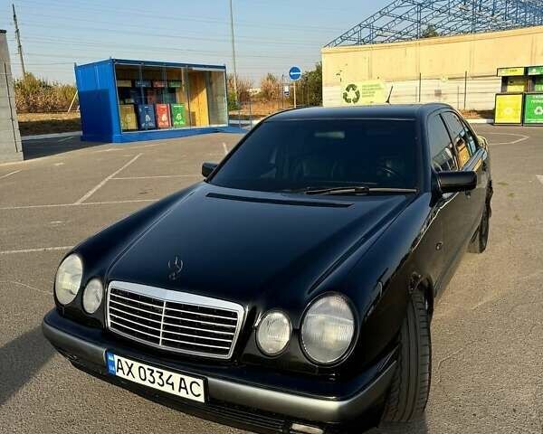 Чорний Мерседес Е-Клас, об'ємом двигуна 2 л та пробігом 300 тис. км за 4500 $, фото 8 на Automoto.ua