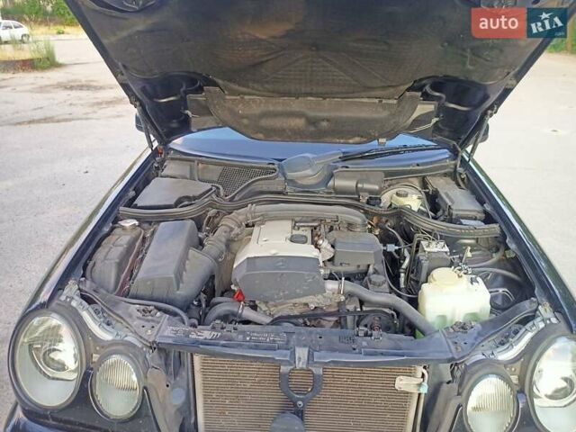 Чорний Мерседес Е-Клас, об'ємом двигуна 2 л та пробігом 312 тис. км за 4900 $, фото 6 на Automoto.ua