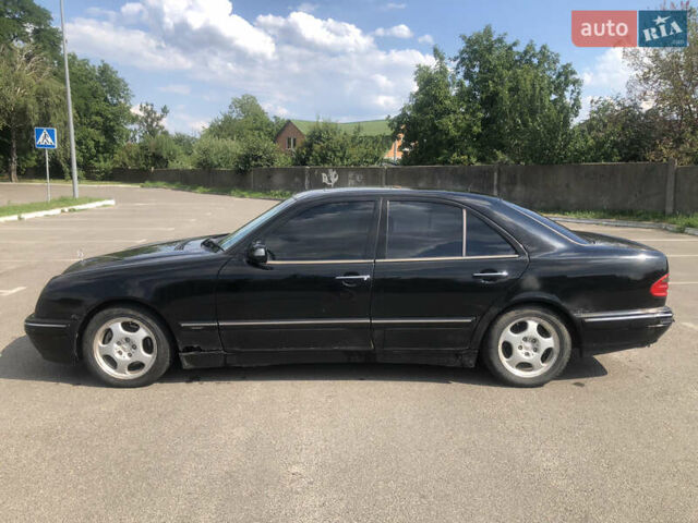 Черный Мерседес Е-Класс, объемом двигателя 2.8 л и пробегом 256 тыс. км за 2999 $, фото 1 на Automoto.ua