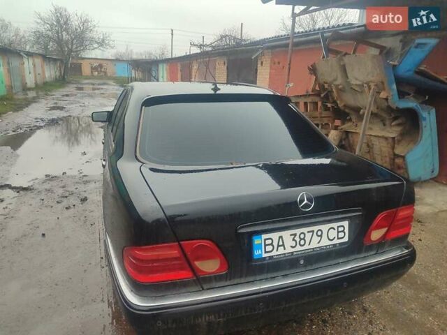 Черный Мерседес Е-Класс, объемом двигателя 2.8 л и пробегом 250 тыс. км за 3500 $, фото 6 на Automoto.ua