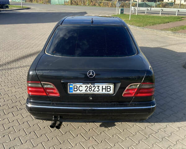 Черный Мерседес Е-Класс, объемом двигателя 2 л и пробегом 100 тыс. км за 3100 $, фото 19 на Automoto.ua